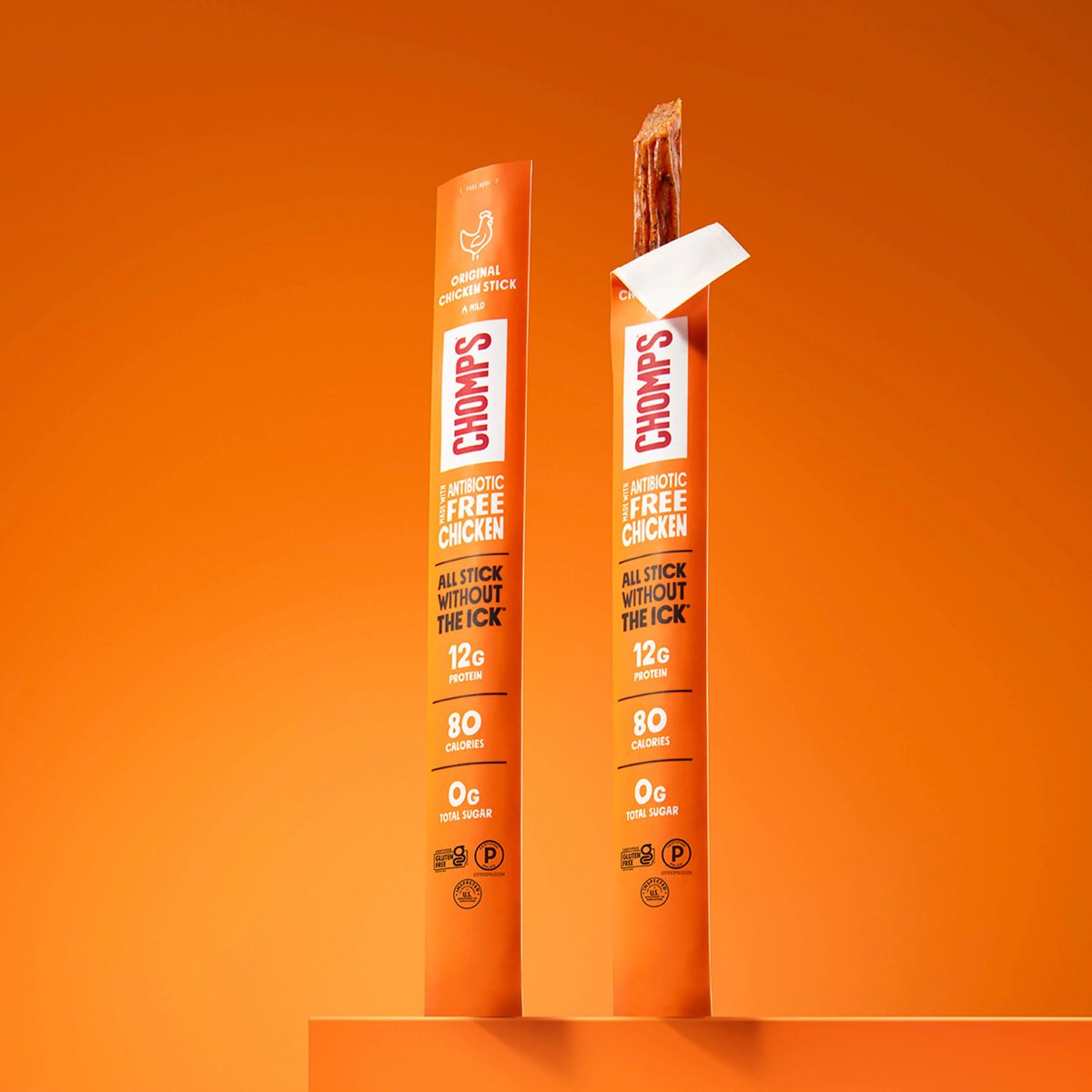 Chomps chicken sticks on orange