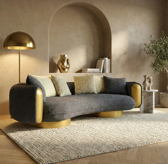 Grey boucle sofa with gold base