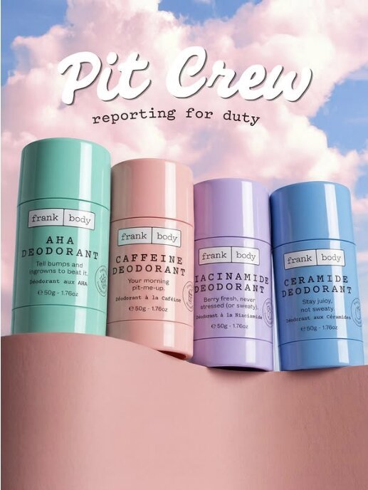 Pastel deodorant sticks against a pink sky