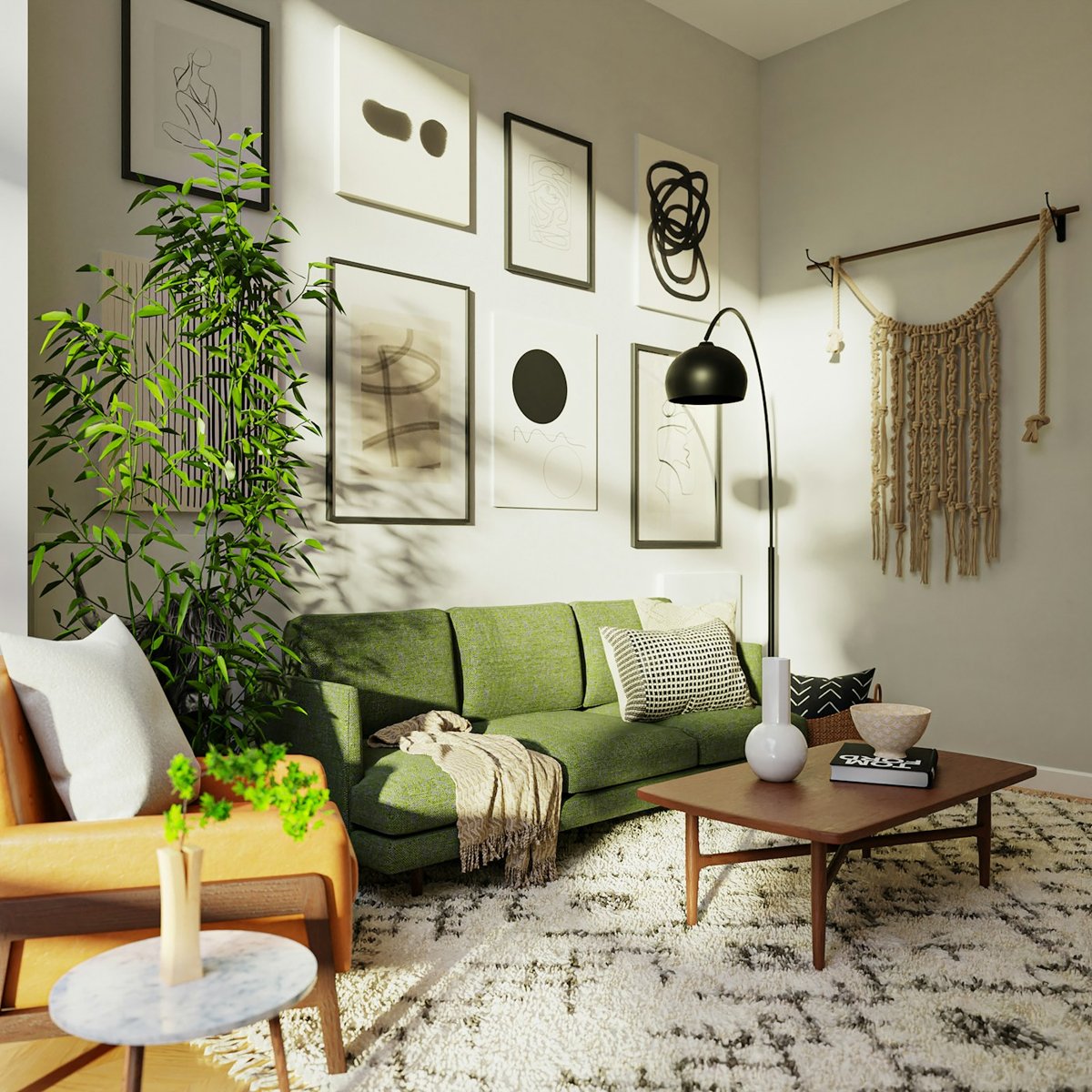 A living room with a green sofa and gallery wall