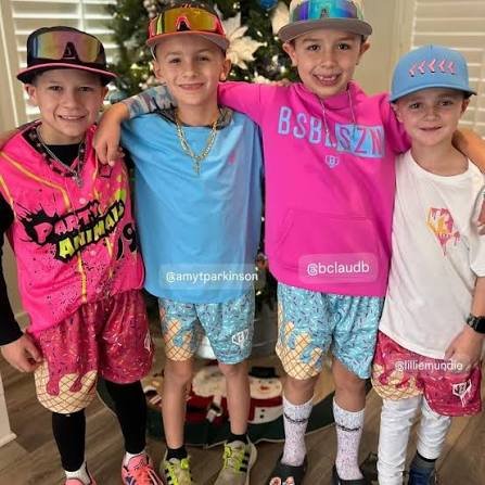 Four boys in Party Animals gear